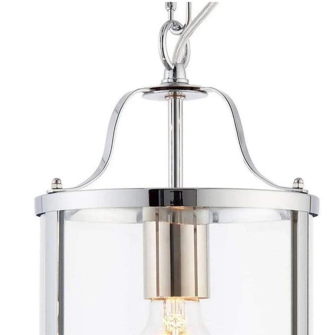Polished silver upper frame and clear glass detail