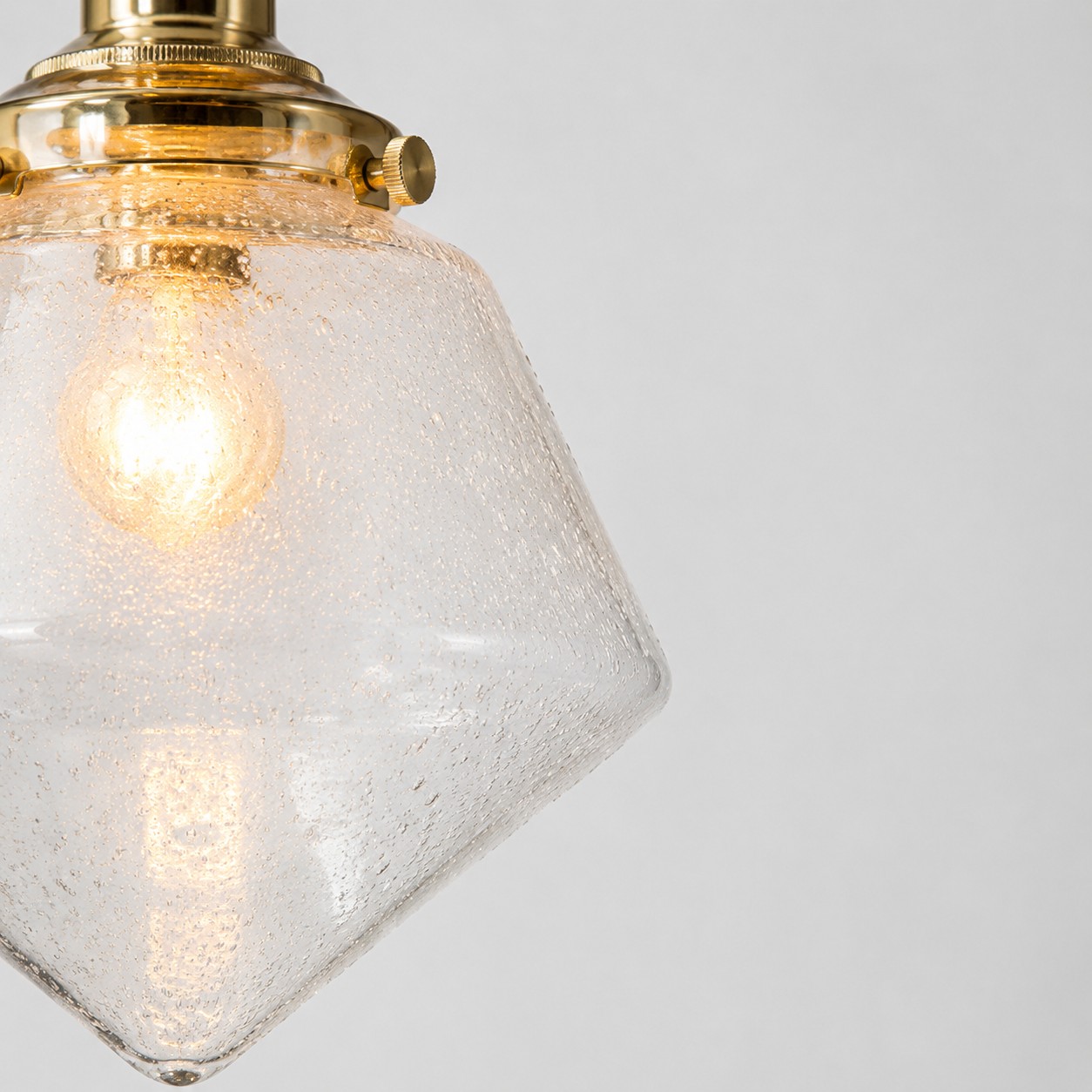 Faceted hand-blown glass shade edge close-up
