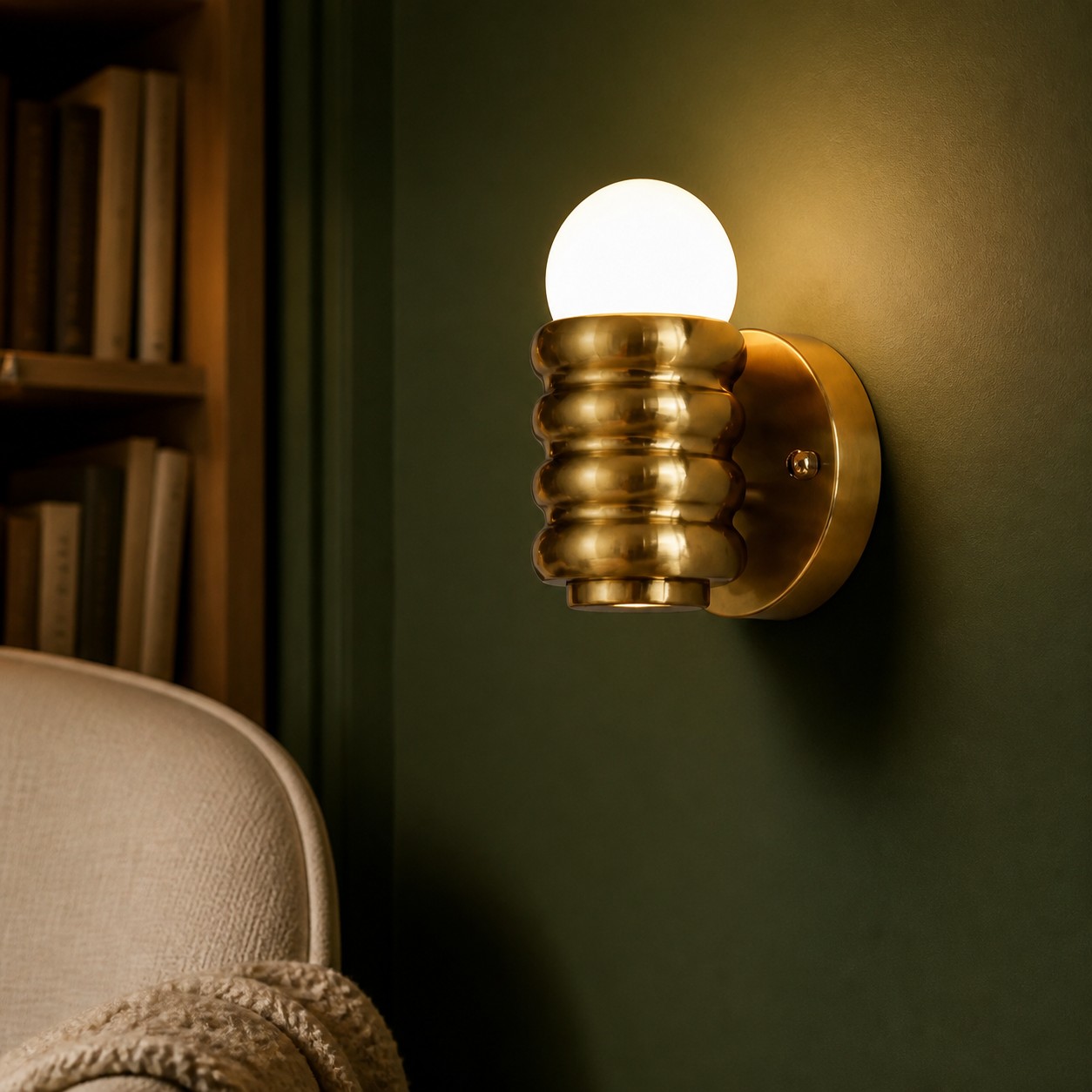 Copper ribbed wall sconce in reading corner