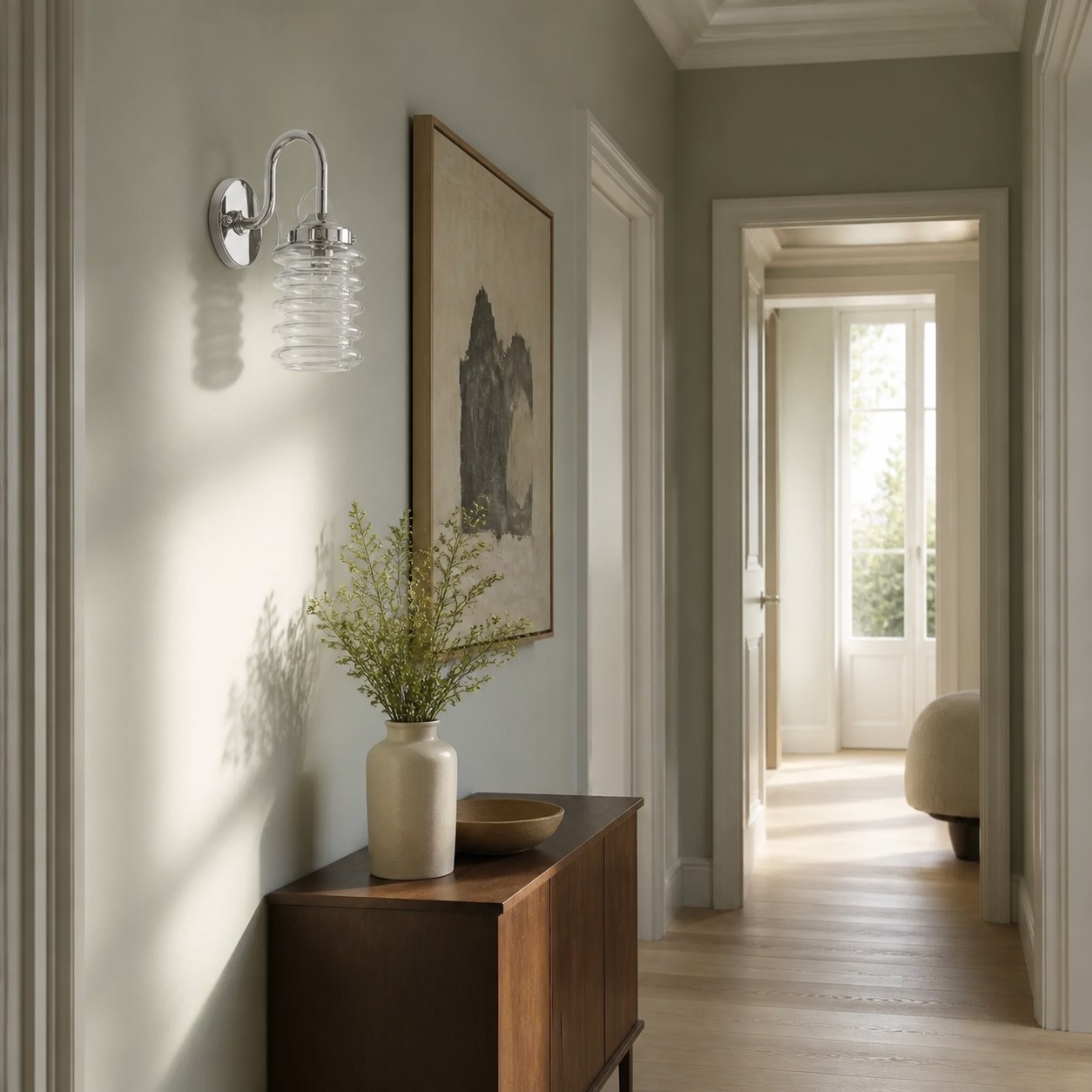 White ribbed glass sconces around a bathroom vanity