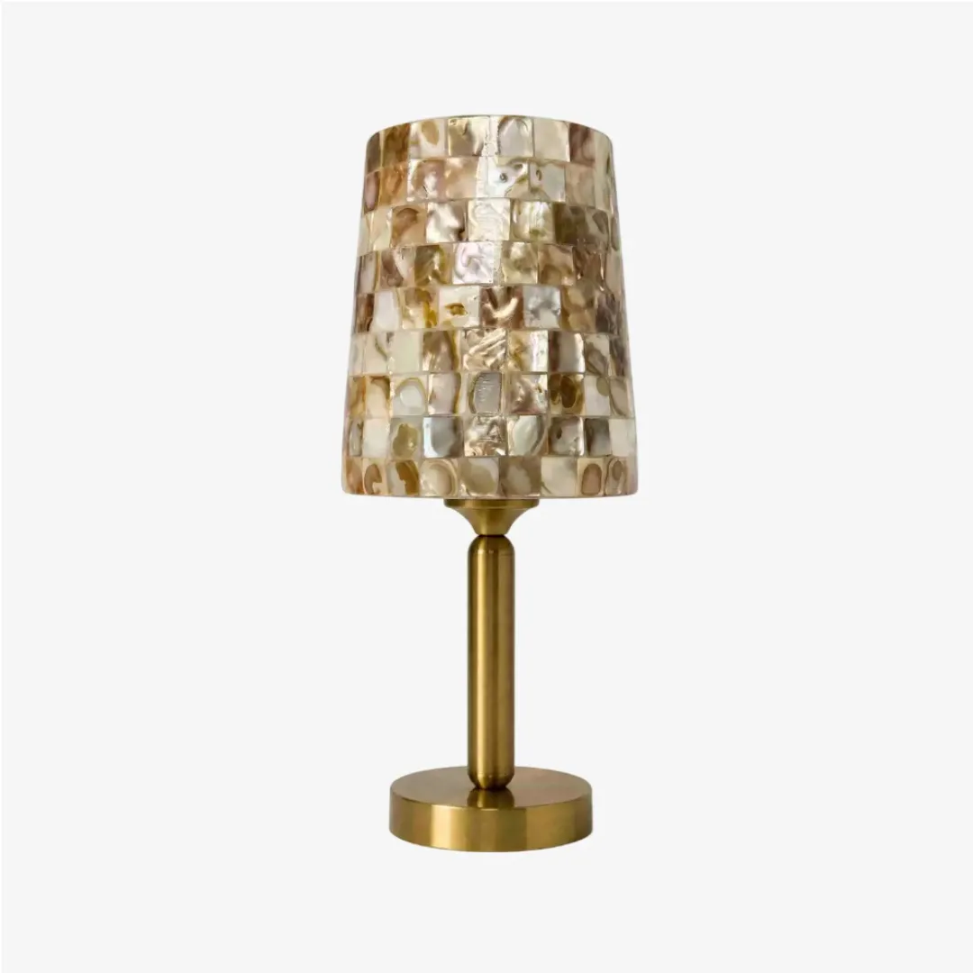 Beige Capiz shell mosaic table lamp on a clean background