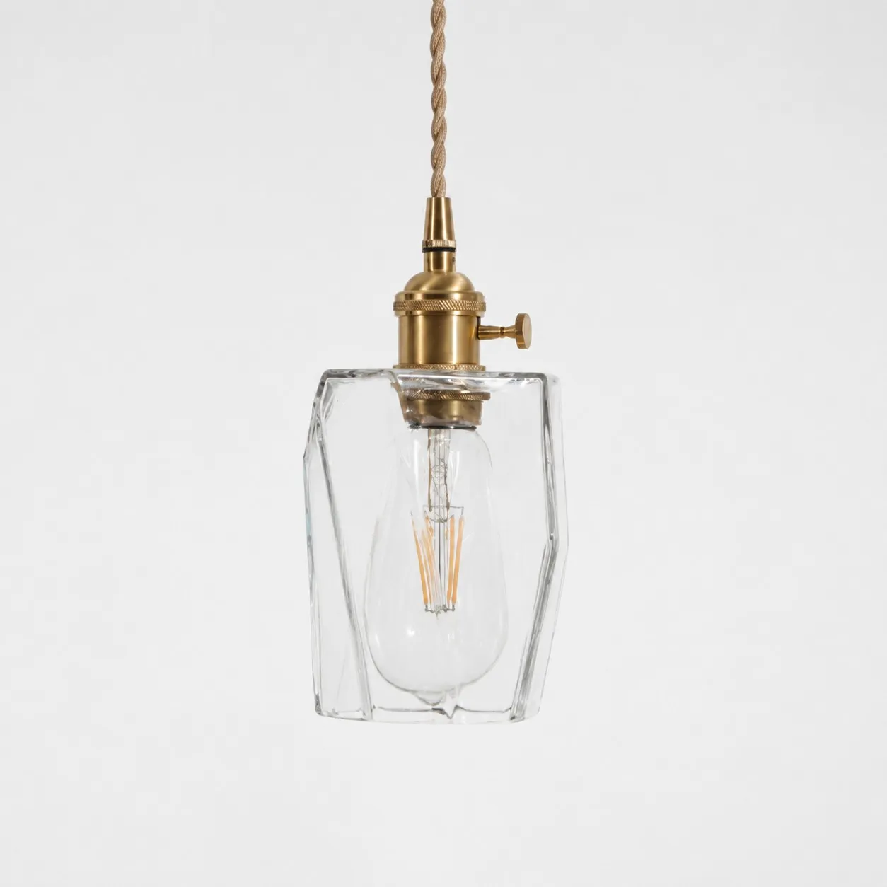 Style X textured glass shade with antique brass E27 socket, front view