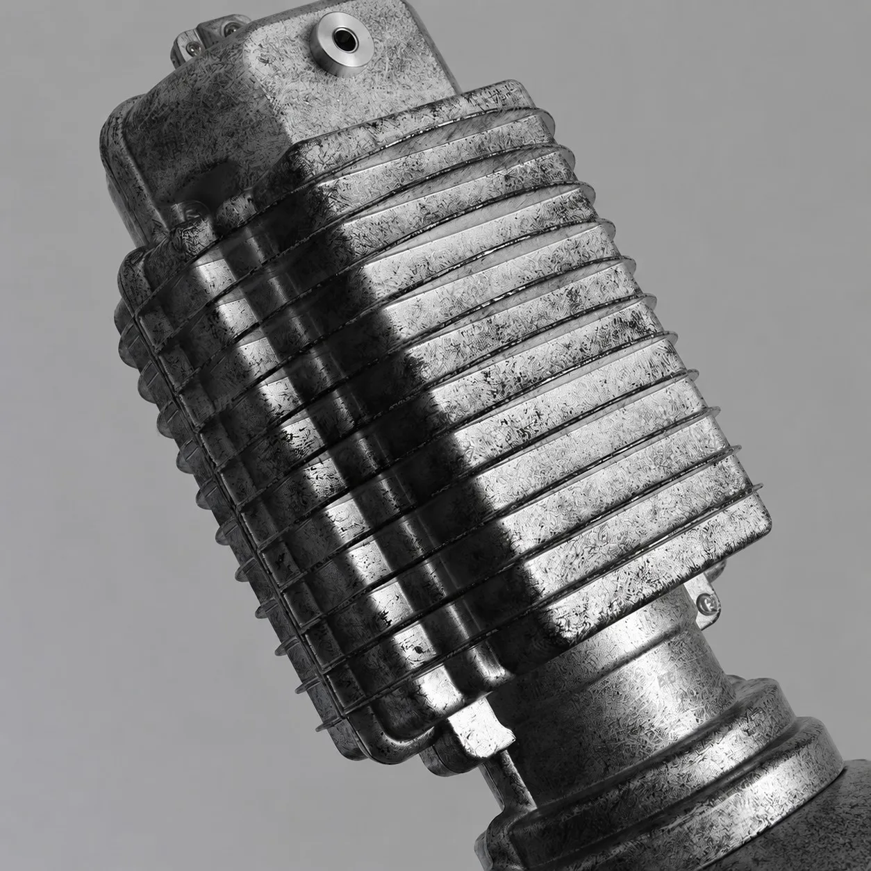 Textured metal socket and wire guard detail