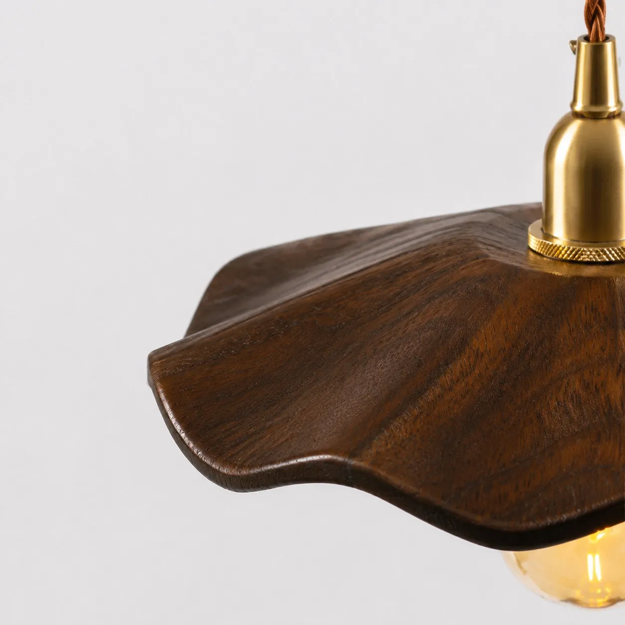 dark wood lotus pendant light carved rim detail
