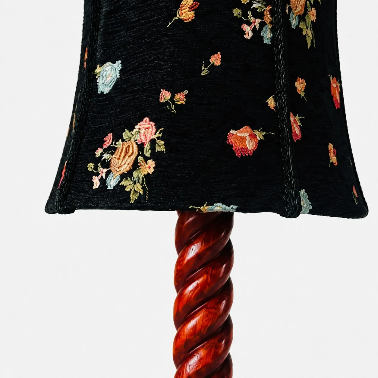 floral fabric and carved wood table lamp