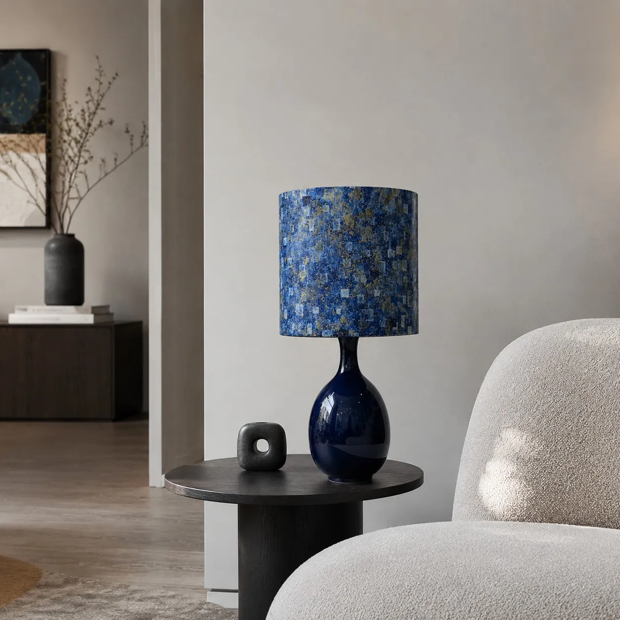 Blue gold fabric ceramic table lamp on a side table