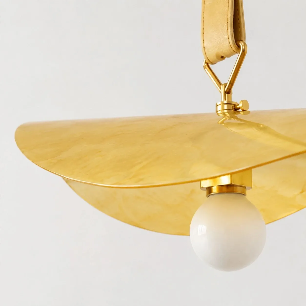 Curved brass shade edge and E27 lamp holder detail