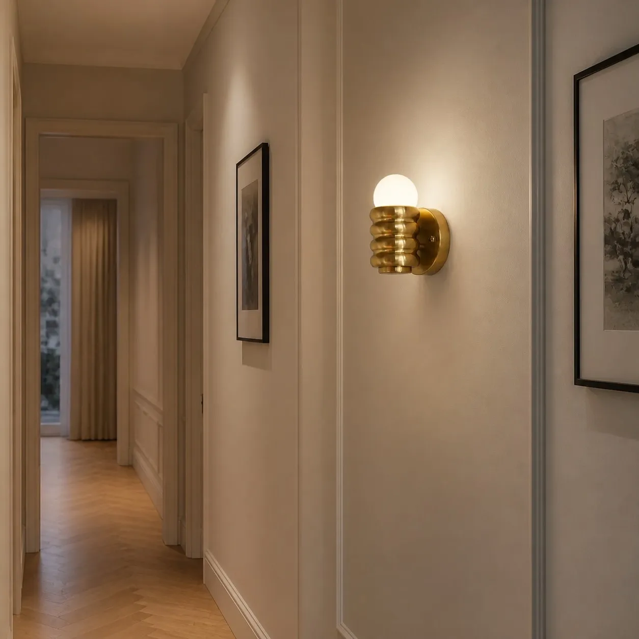 Copper wall sconce in French apartment hallway