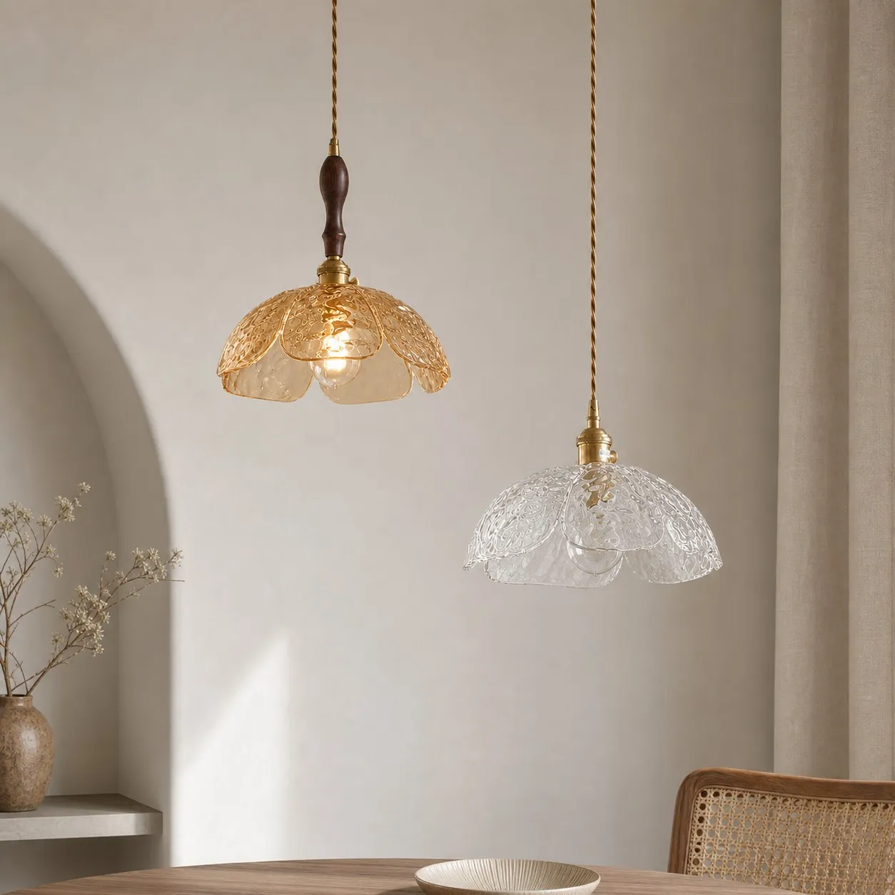 Amber walnut and clear brass pendants shown together