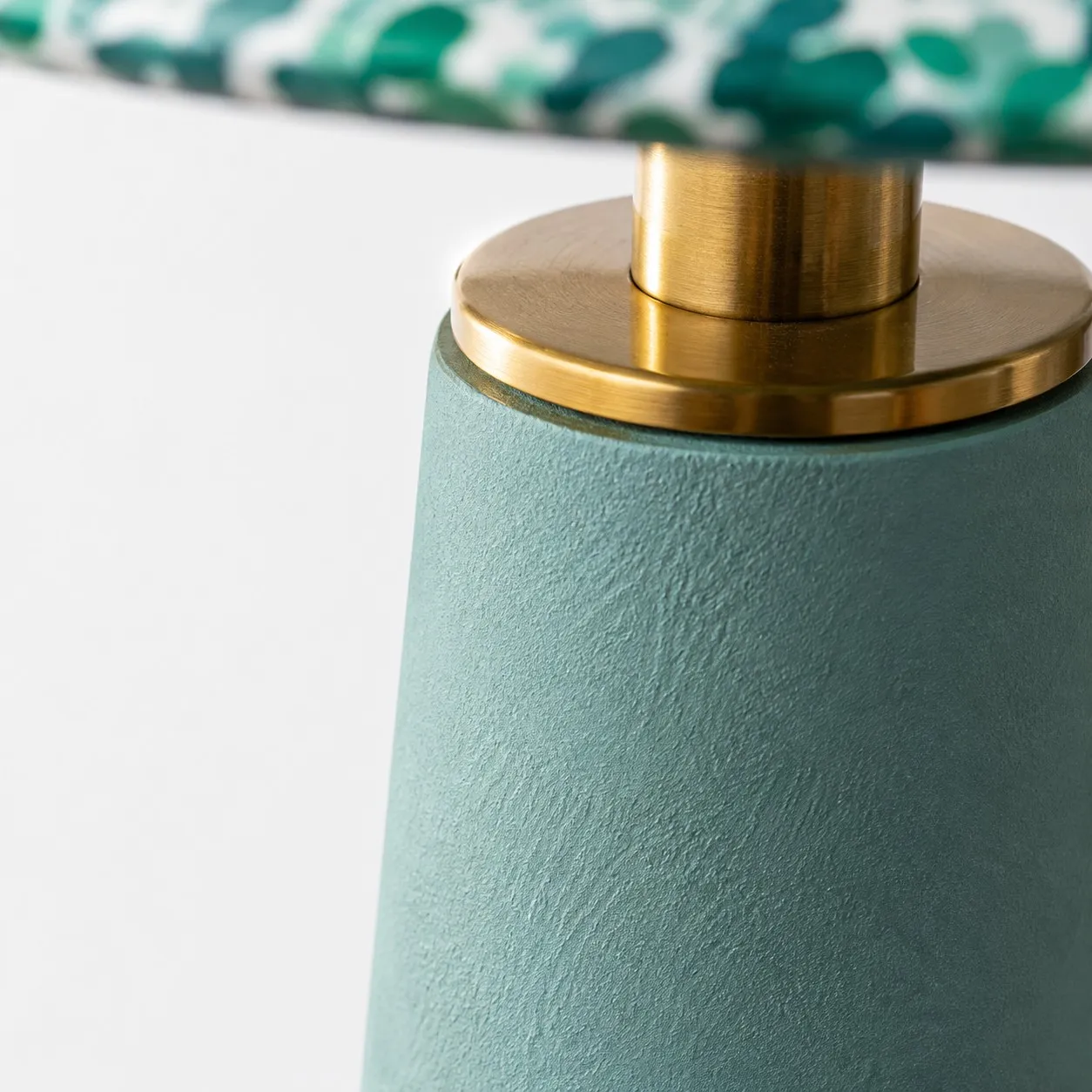 Close view of the metal connector and ceramic body texture