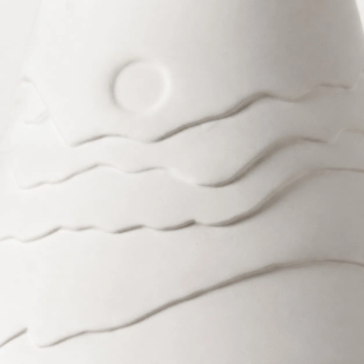 Close view of the sculpted ceramic surface