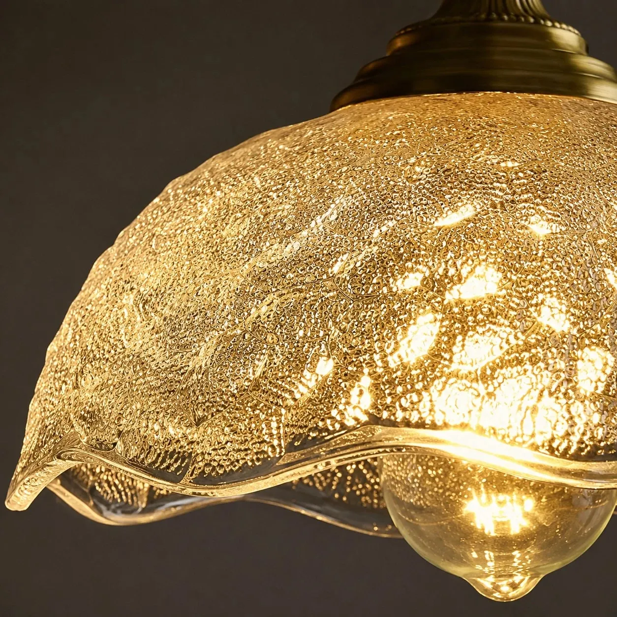 Close-up of scalloped pressed glass texture
