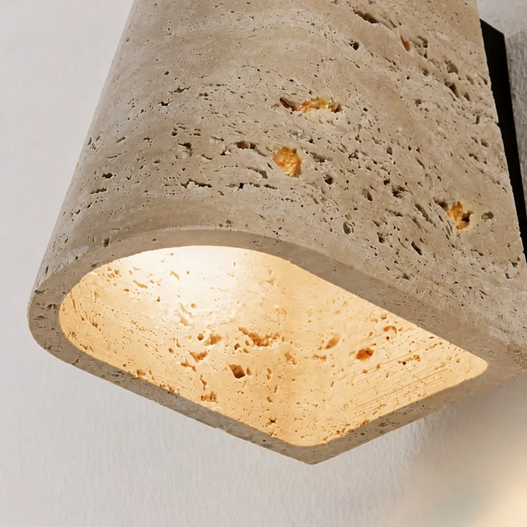 Lower opening and softly illuminated travertine edge