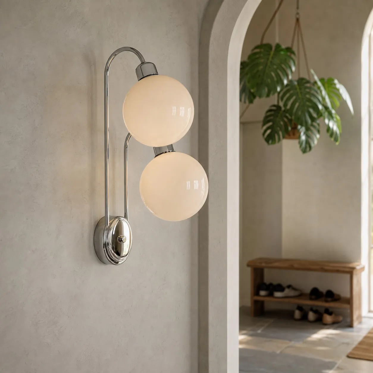 Milk coffee glass globe wall lamp above a vanity table