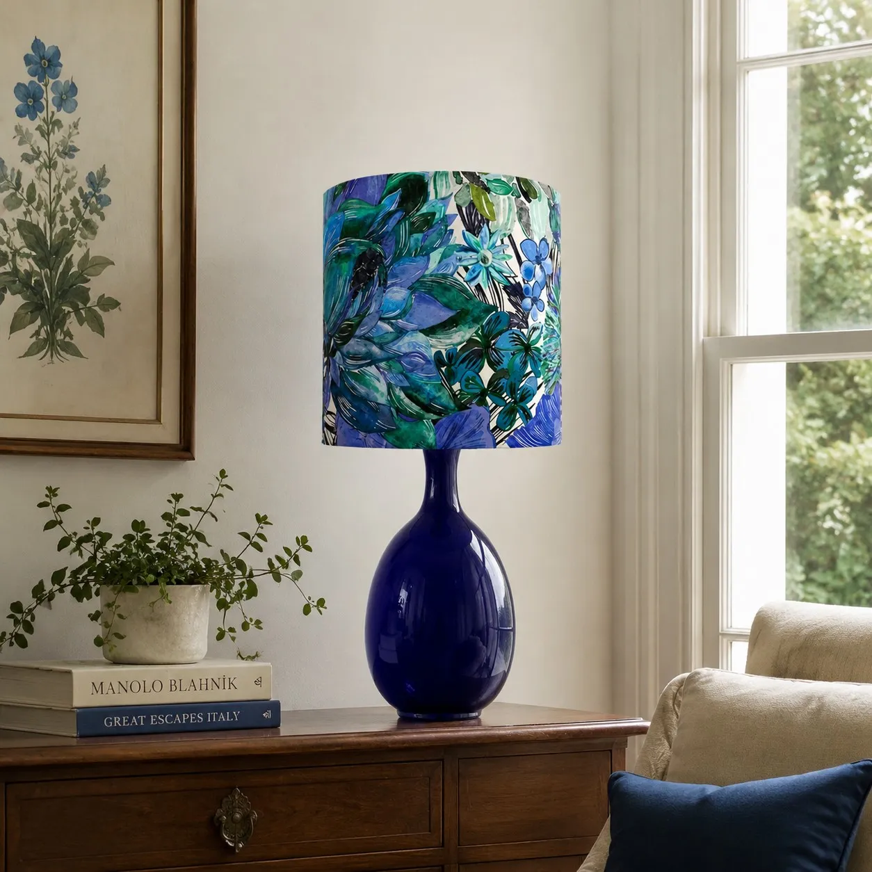 Green botanical fabric ceramic table lamp styled by a sofa