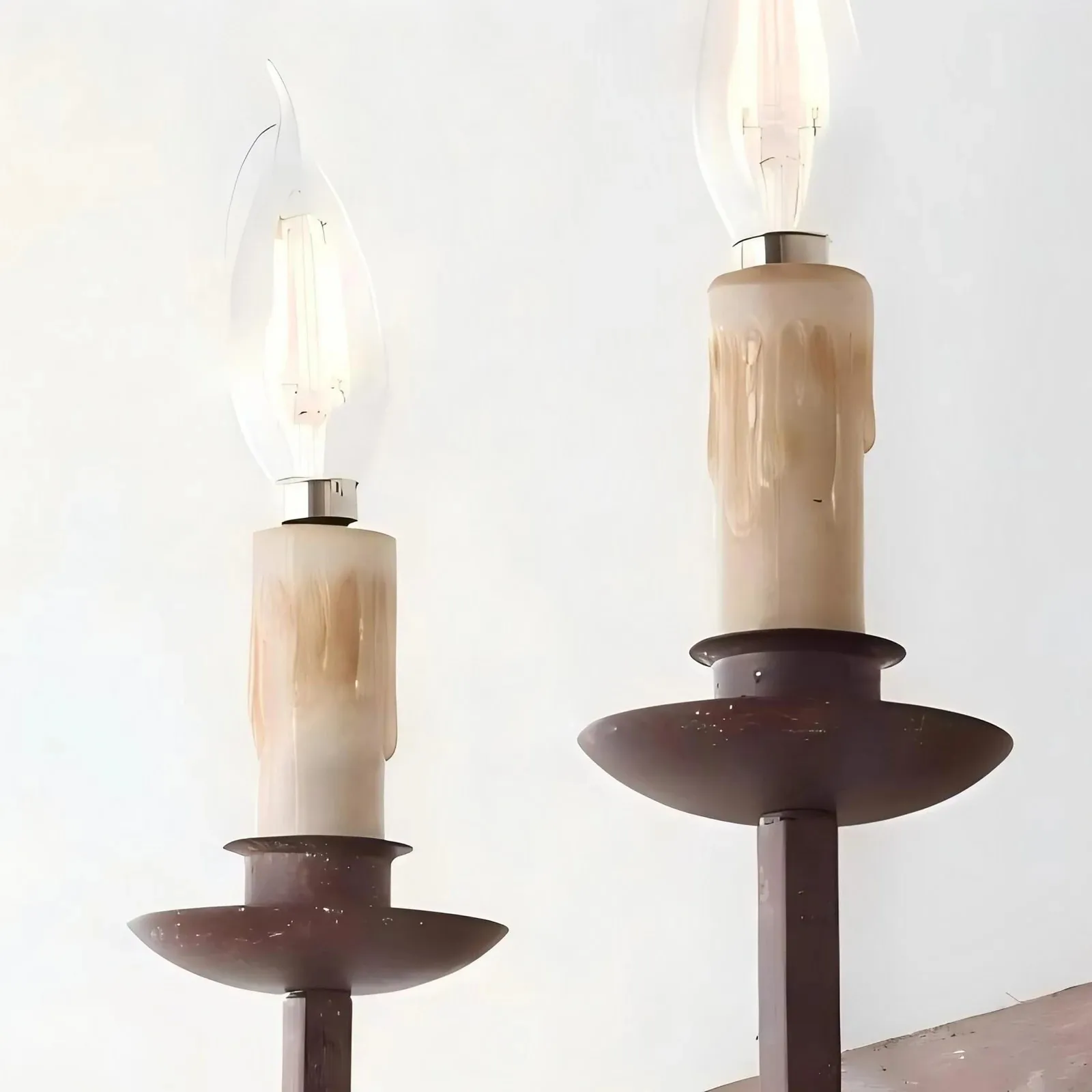 Close detail of the candle style sleeves and warm flame shaped bulbs
