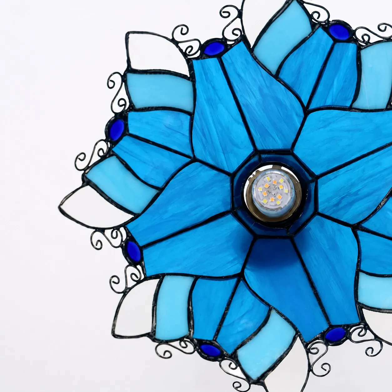 Blue Stained Glass Wall Sconce With Curved Arm