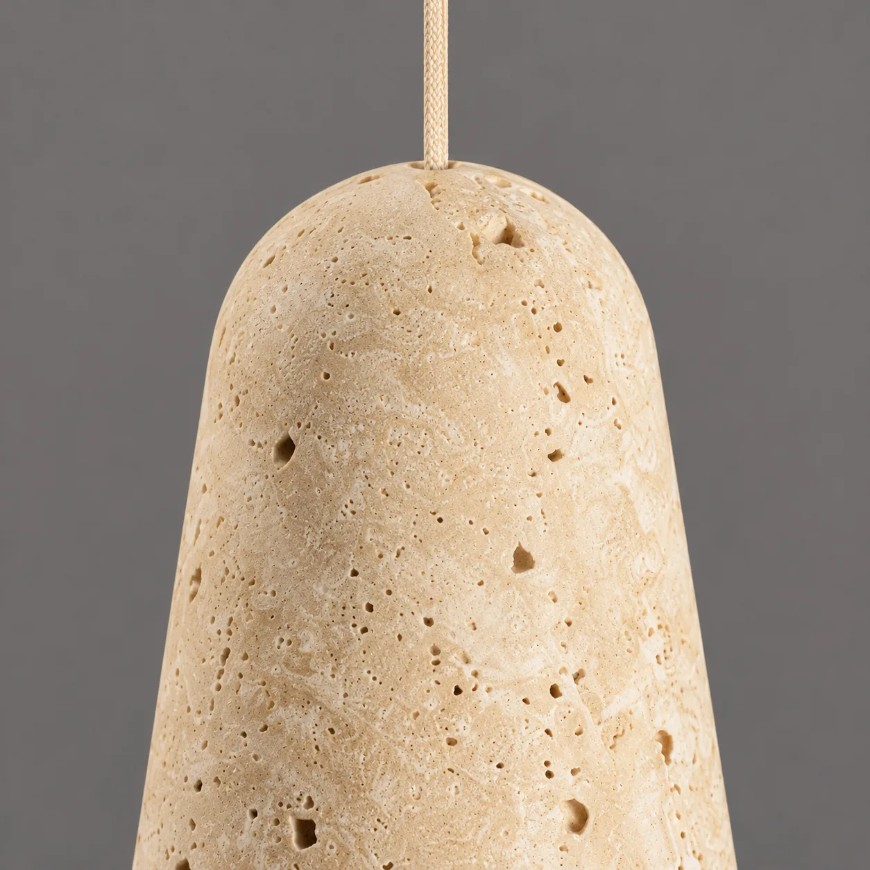 Cone profile of the yellow travertine pendant